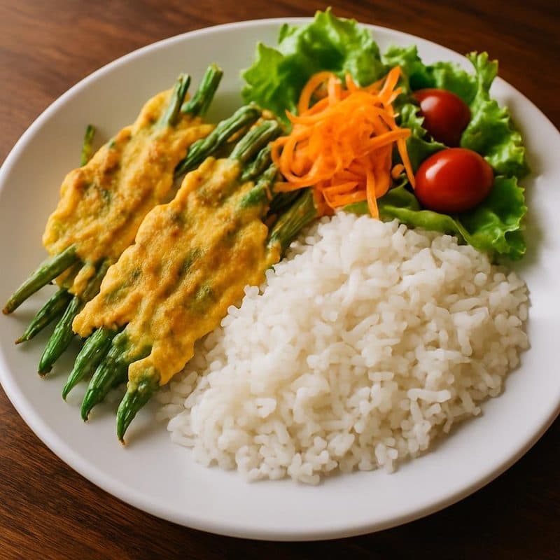 Barbudos acompañados de arroz blanco, vegetales y ensalada